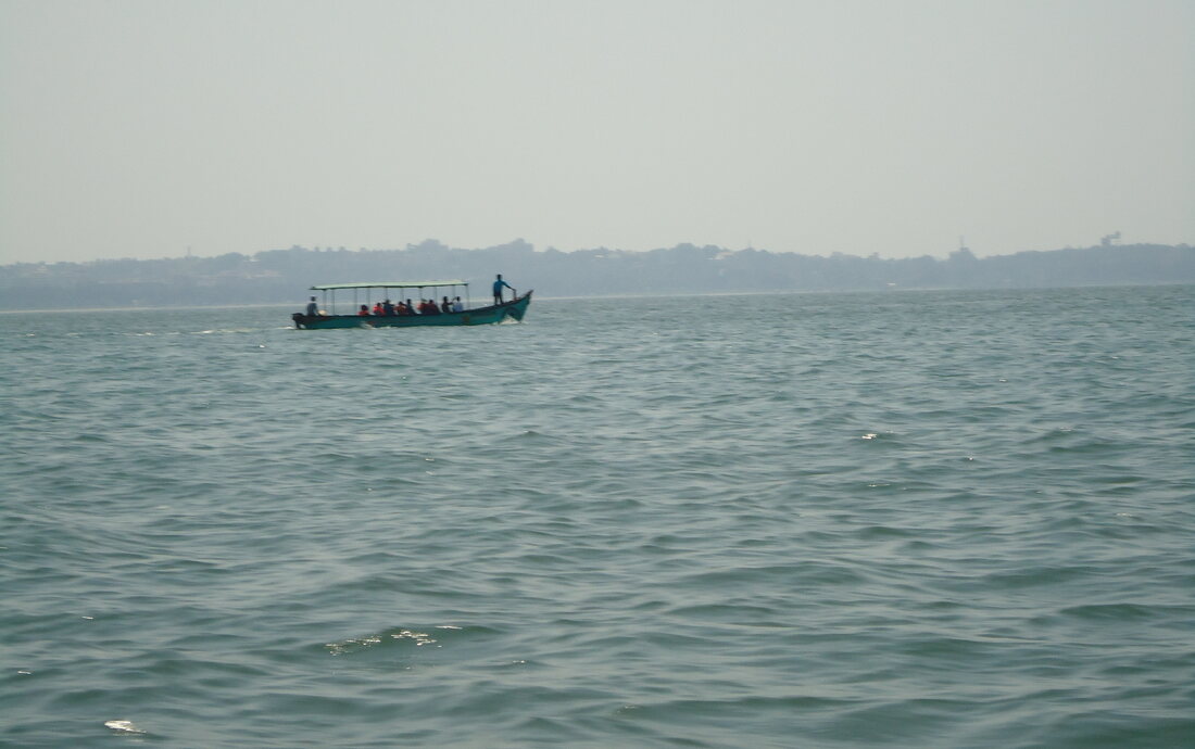 Motorboat navigating coastal waters